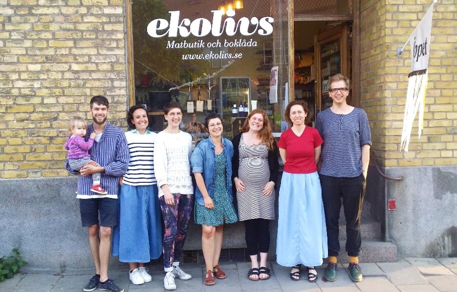 Ekolivs members in front of the store